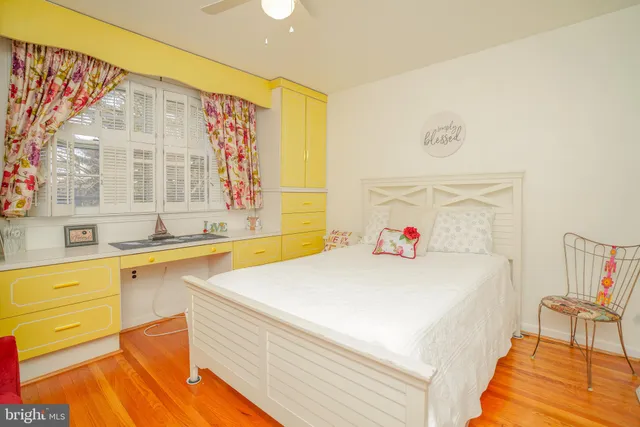 a utility room with cabinets washer and dryer