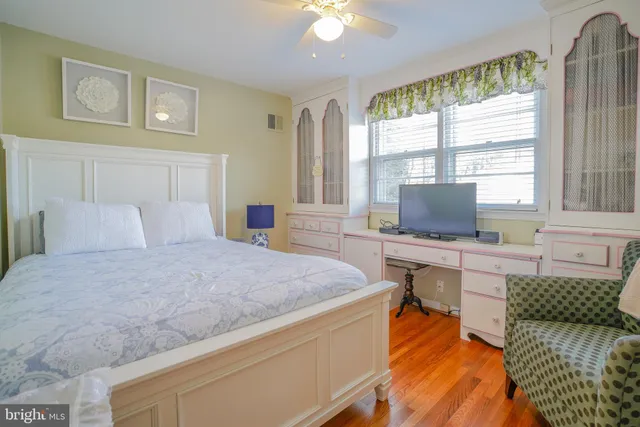 a bathroom with a sink toilet and mirror