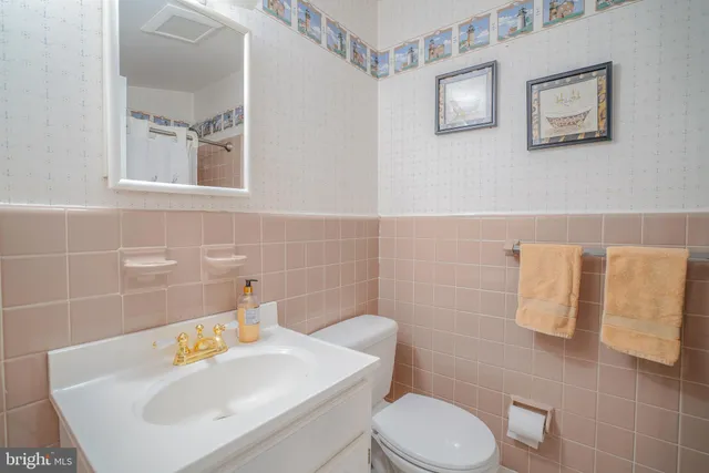 a view of a kitchen from the hallway