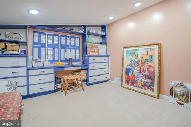 a view of a house with sitting area and garden