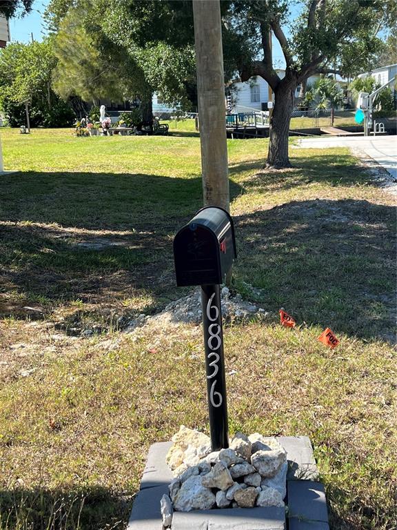 6836 Sea Ranch Drive Hudson, FL 34667 - Photo 10 of 10 a view of a lake with a beach