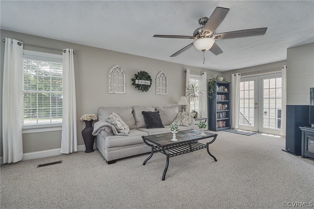 2617 Lampworth Road Henrico, VA 23231 - Photo 18 of 45 a living room with furniture and a window