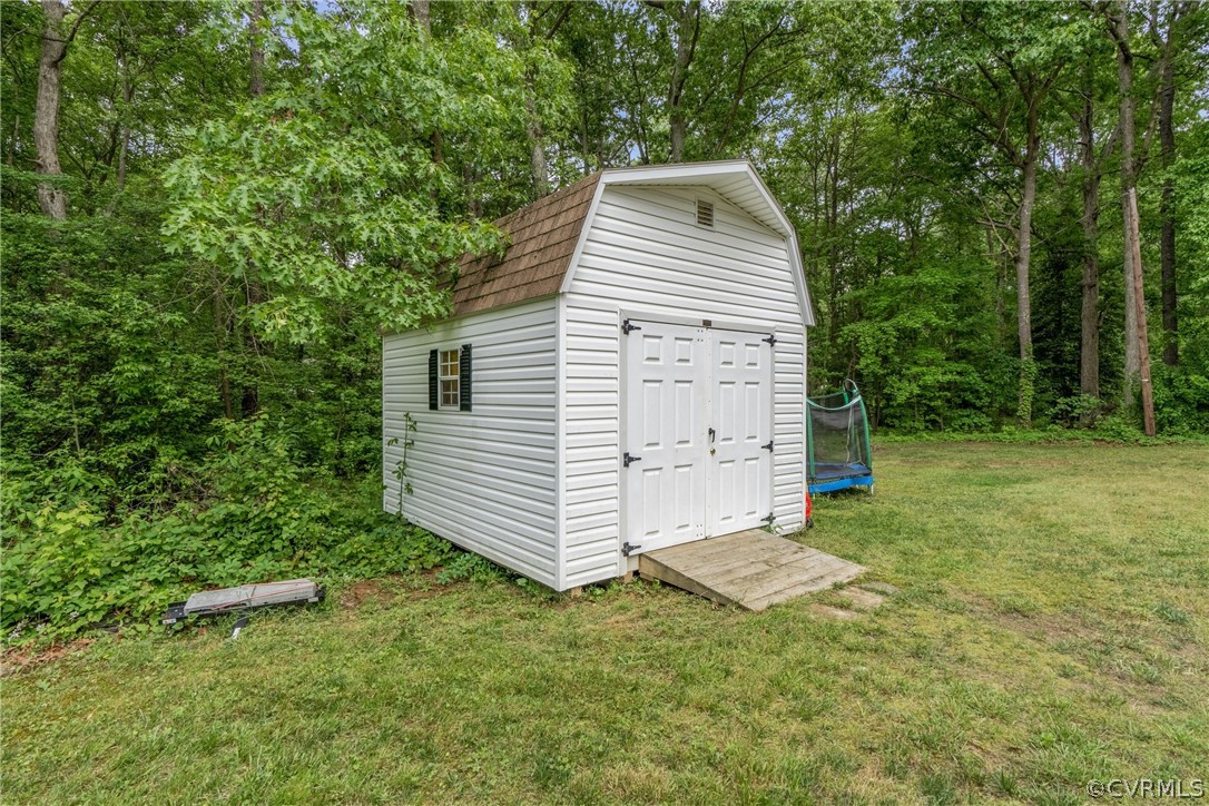 2617 Lampworth Road Henrico, VA 23231 - Photo 31 of 45 a view of a house with a backyard