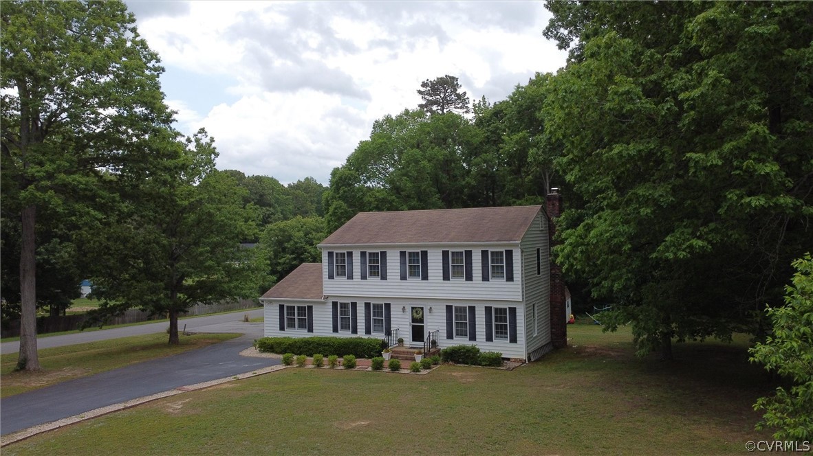 2617 Lampworth Road Henrico, VA 23231 - Photo 36 of 45 a front view of a house with a garden