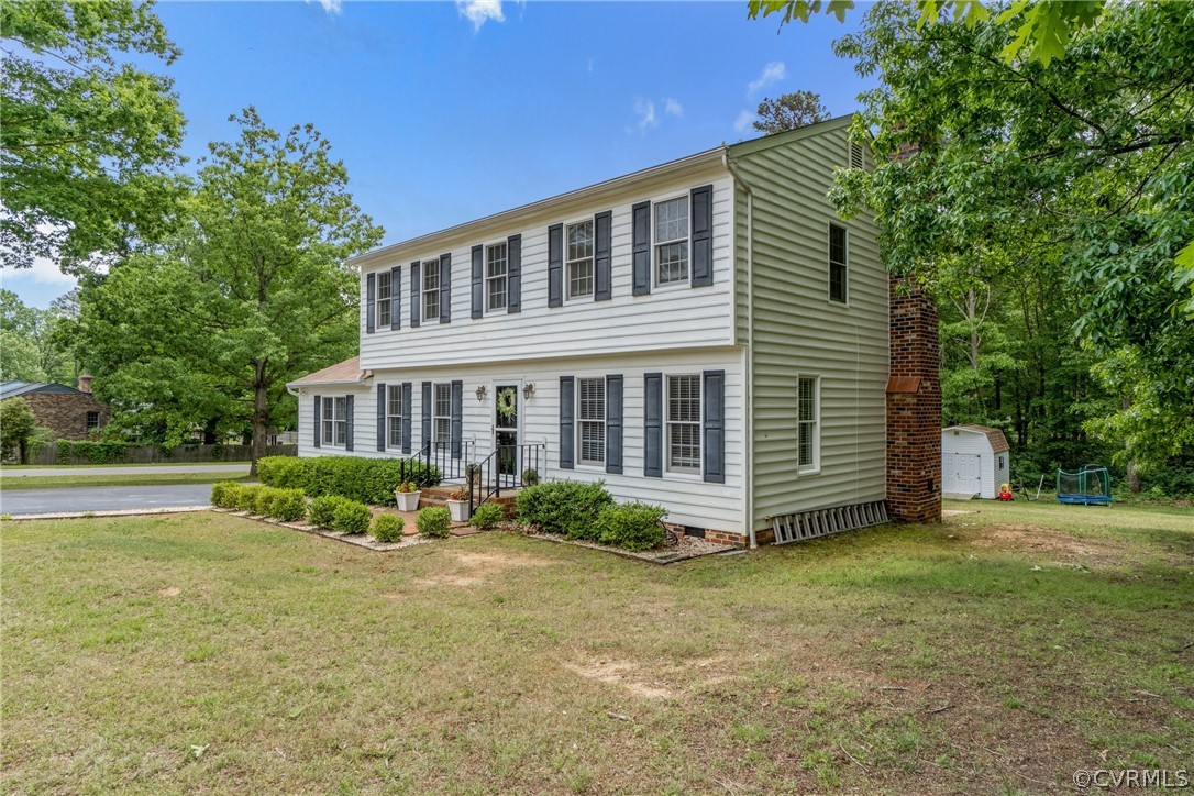 2617 Lampworth Road Henrico, VA 23231 - Photo 5 of 45 a front view of a house with garden