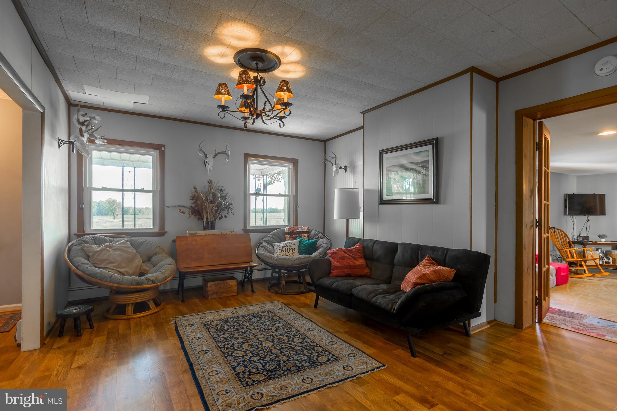 10380 Chapel Road Easton, MD 21601 - Photo 12 of 95 a living room with furniture and a window