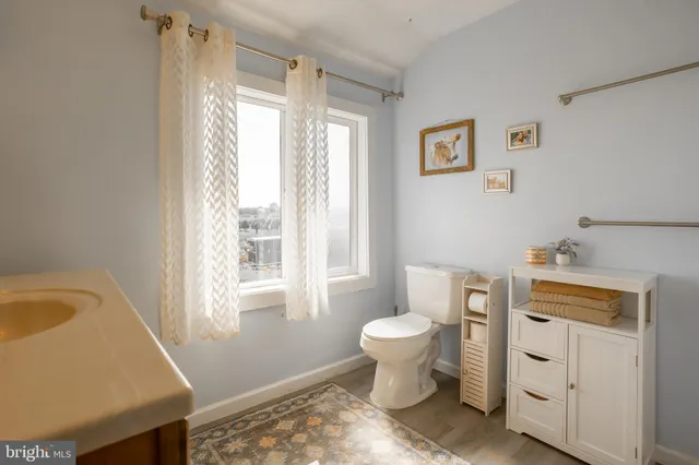 a swimming pool with outdoor seating and yard