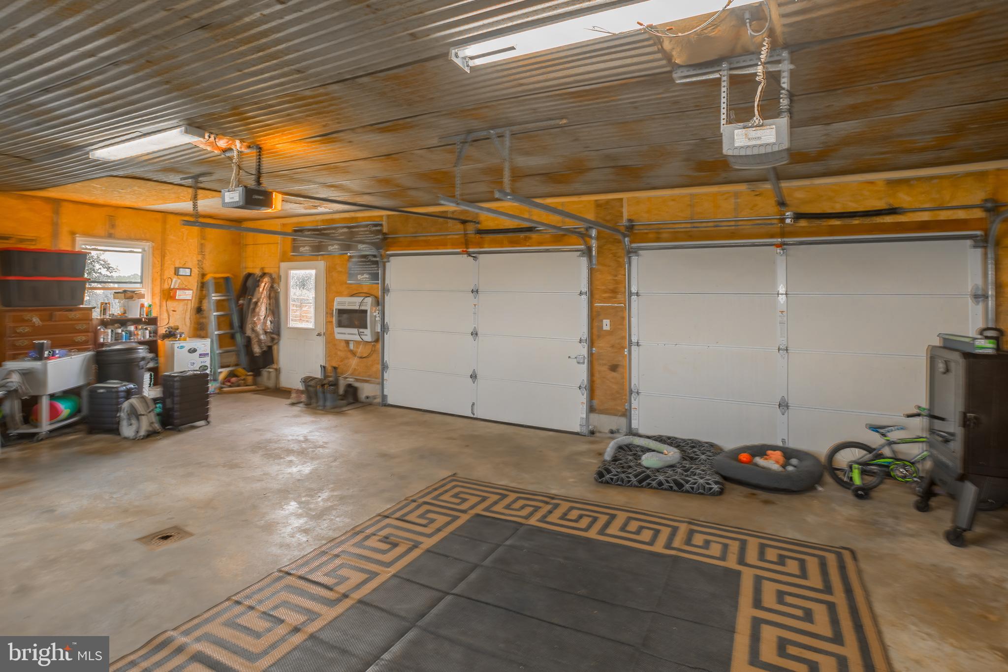 10380 Chapel Road Easton, MD 21601 - Photo 8 of 95 a view of a garage with parked cars