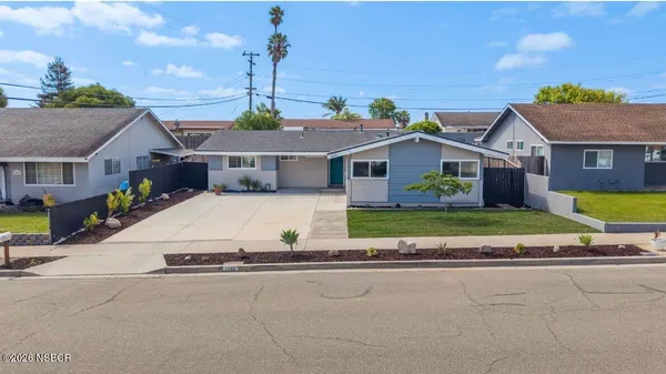 front view of house with a yard