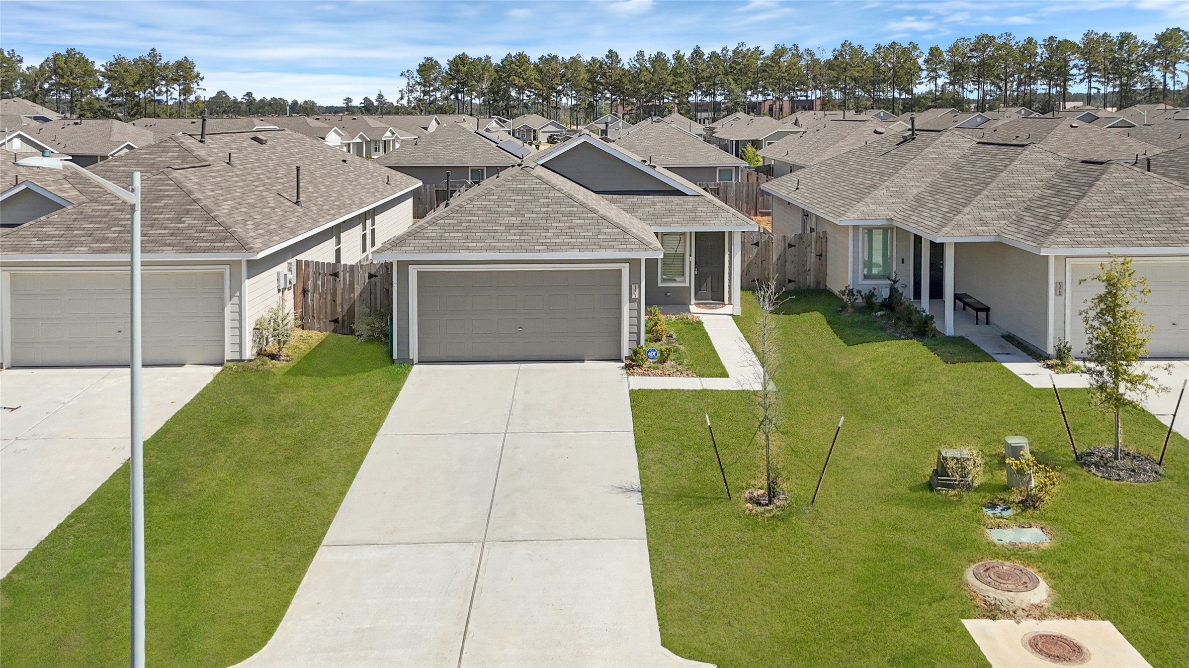 an aerial view of a house with swimming pool