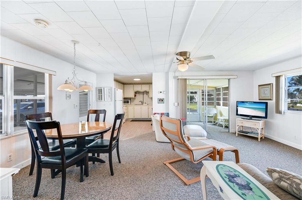 11 Moonstone Circle Naples, FL 34112 - Photo 1 of 20 a dining room with furniture and window