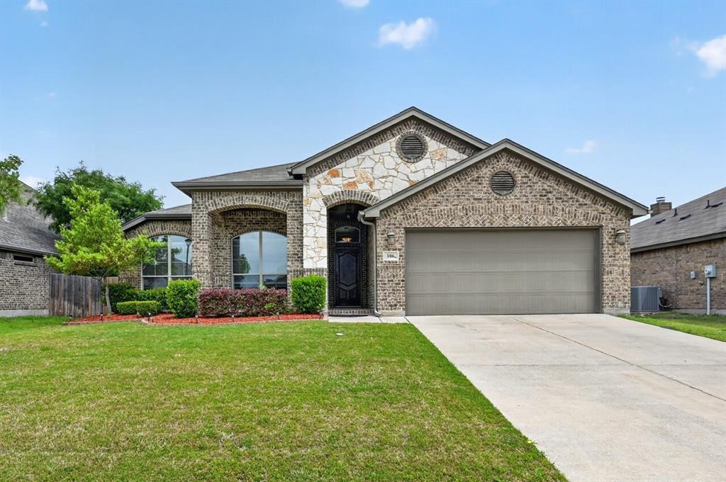106 Zion Lane Forney, TX 75126 - Photo 1 of 37 a front view of a house with a yard and garage