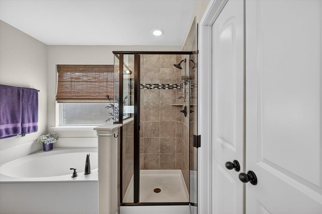 106 Zion Lane Forney, TX 75126 - Photo 19 of 37 a bathroom with a shower and a sink