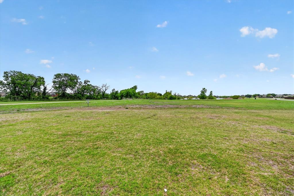 106 Zion Lane Forney, TX 75126 - Photo 30 of 37 a view of a field with an ocean