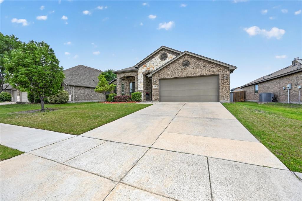 106 Zion Lane Forney, TX 75126 - Photo 3 of 37 a front view of house with yard