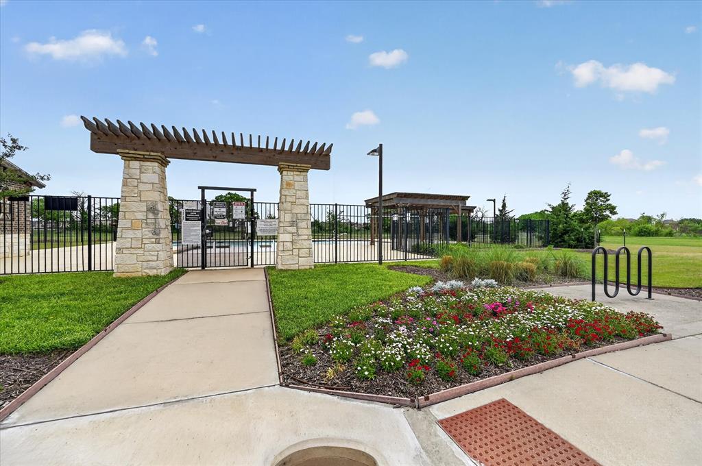 106 Zion Lane Forney, TX 75126 - Photo 31 of 37 a view of a patio with a garden