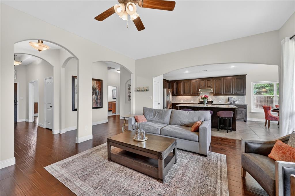 106 Zion Lane Forney, TX 75126 - Photo 7 of 37 a living room with furniture and kitchen view