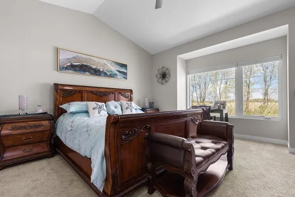 a bed room with a bed and a couch