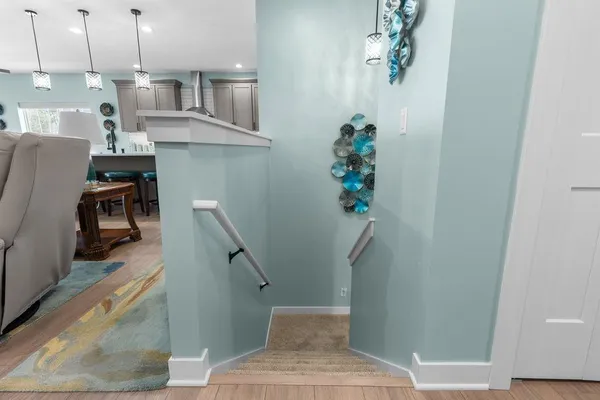 a view of a living room with furniture