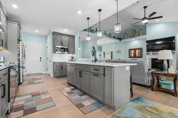 a large kitchen with cabinets