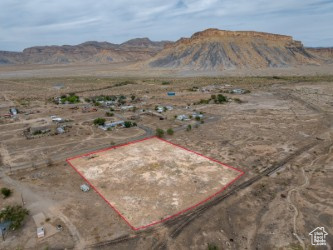 68 King Street Thompson, UT 84540 - Photo 15 of 23 View of mountain backdrop featuring rural landscape and a desert landscape