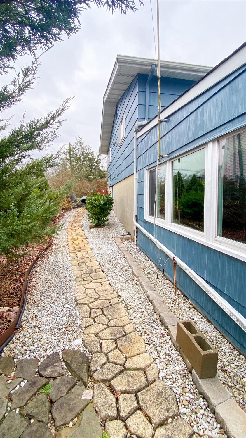 61 Stephenville Parkway Edison, NJ 08820 - Photo 28 of 32 a view of a house with a yard