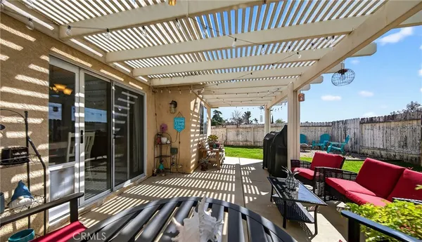 a view of a porch with furniture