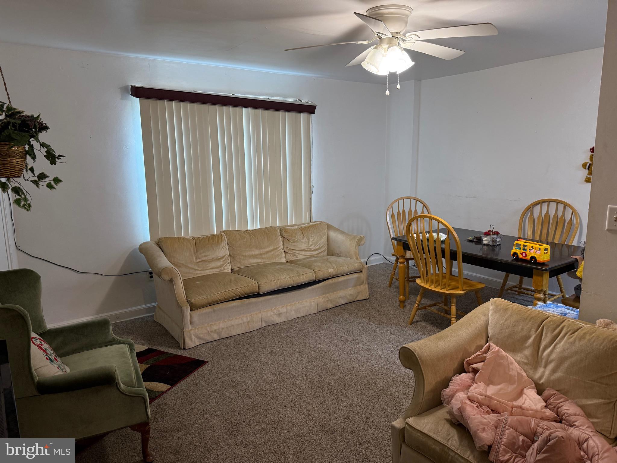 2112 Seneca Road Wilmington, DE 19805 - Photo 12 of 26 a living room with furniture and a window