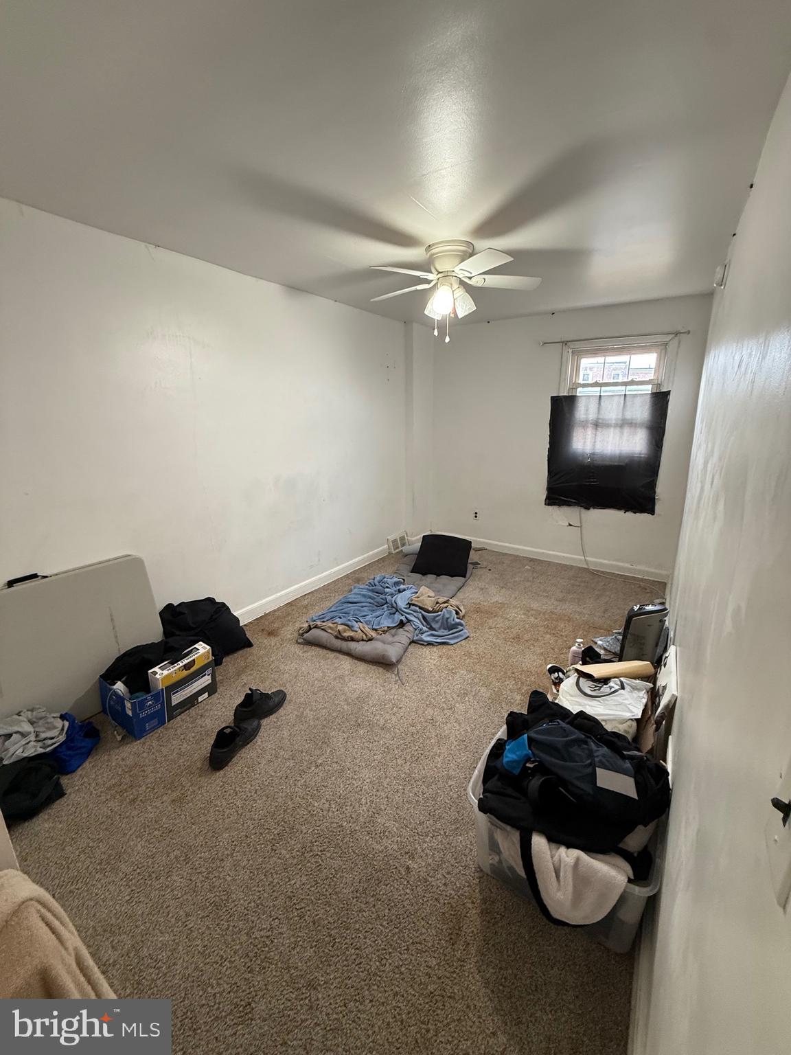 2112 Seneca Road Wilmington, DE 19805 - Photo 17 of 26 a room with furniture and a flat screen tv