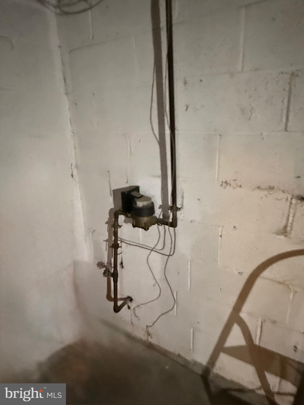 2112 Seneca Road Wilmington, DE 19805 - Photo 25 of 26 a view of storage and utility room with racks on the wall