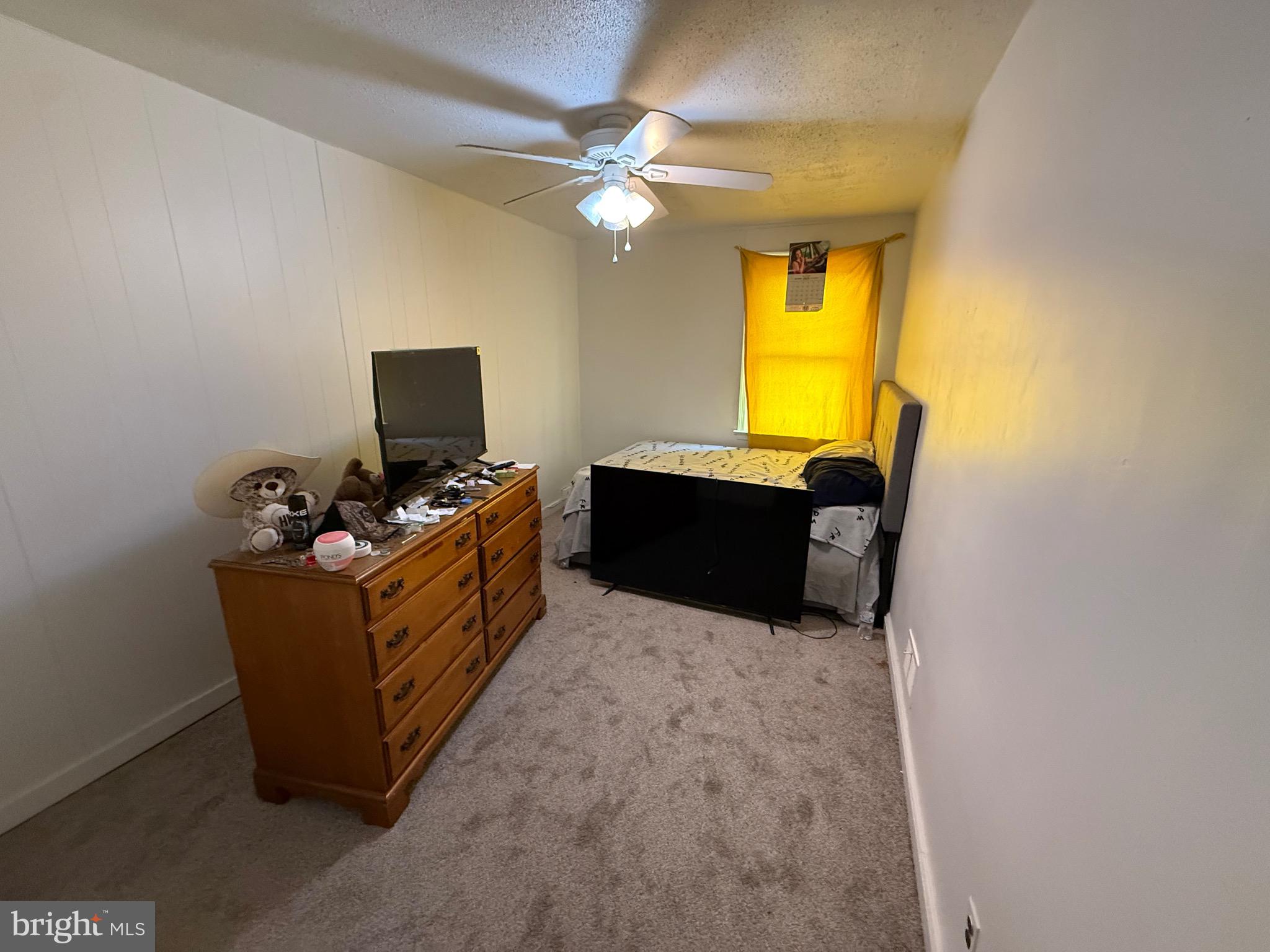 2112 Seneca Road Wilmington, DE 19805 - Photo 10 of 26 a living room with furniture and a flat screen tv