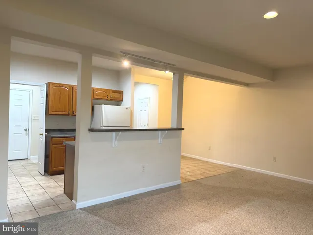 a view of a kitchen with a sink