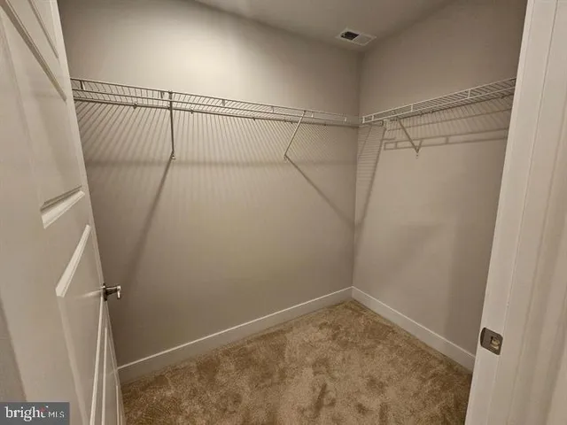 a bathroom with a tub and shower