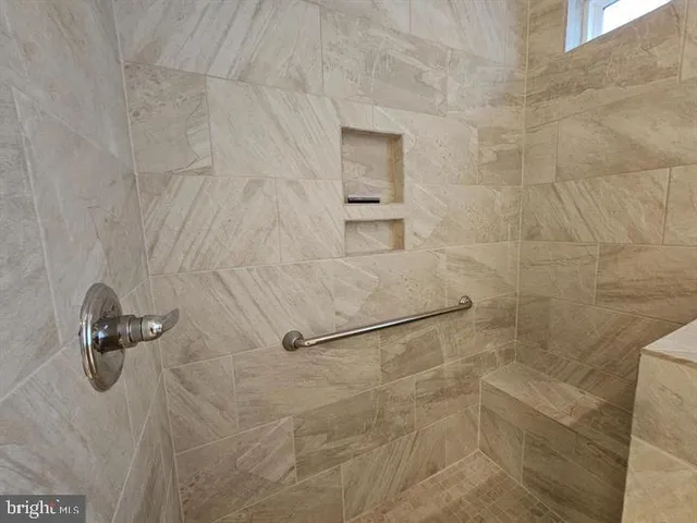 a kitchen with stainless steel appliances a white refrigerator oven a sink and dishwasher