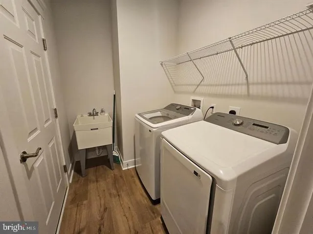 a view of an empty room with windows