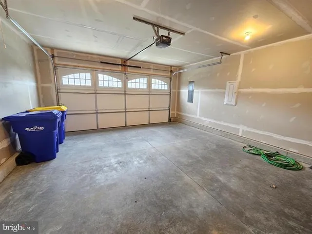 a view of a garden with an outdoor space