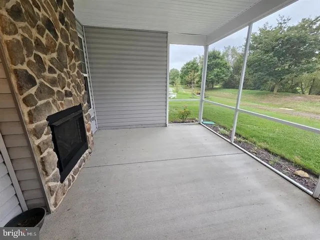 a view of a livingroom with a fireplace