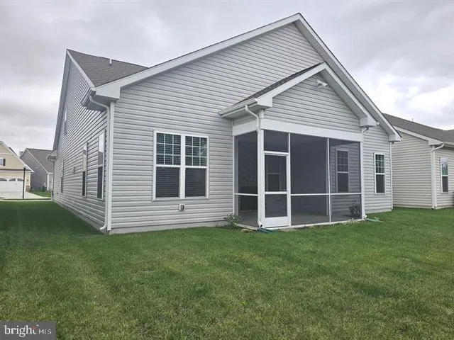 a view of an house with backyard space