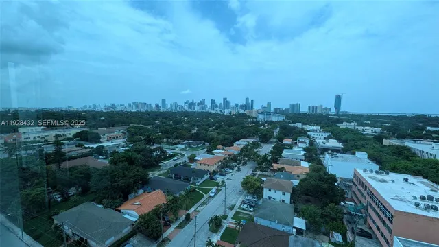 an aerial view of a city with lots of residential buildings