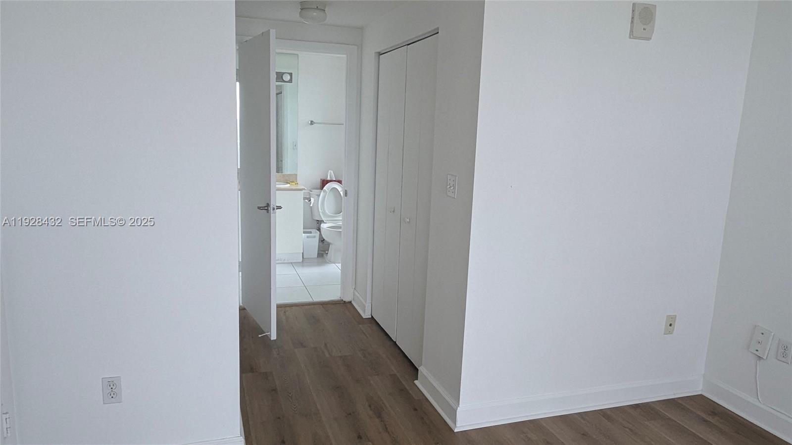 1401 Southwest 22nd Street, Unit 1405 Miami, FL 33145 - Photo 8 of 13 a view of a hallway with wooden floor