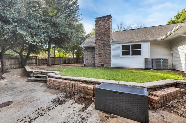 a house with trees in front of it