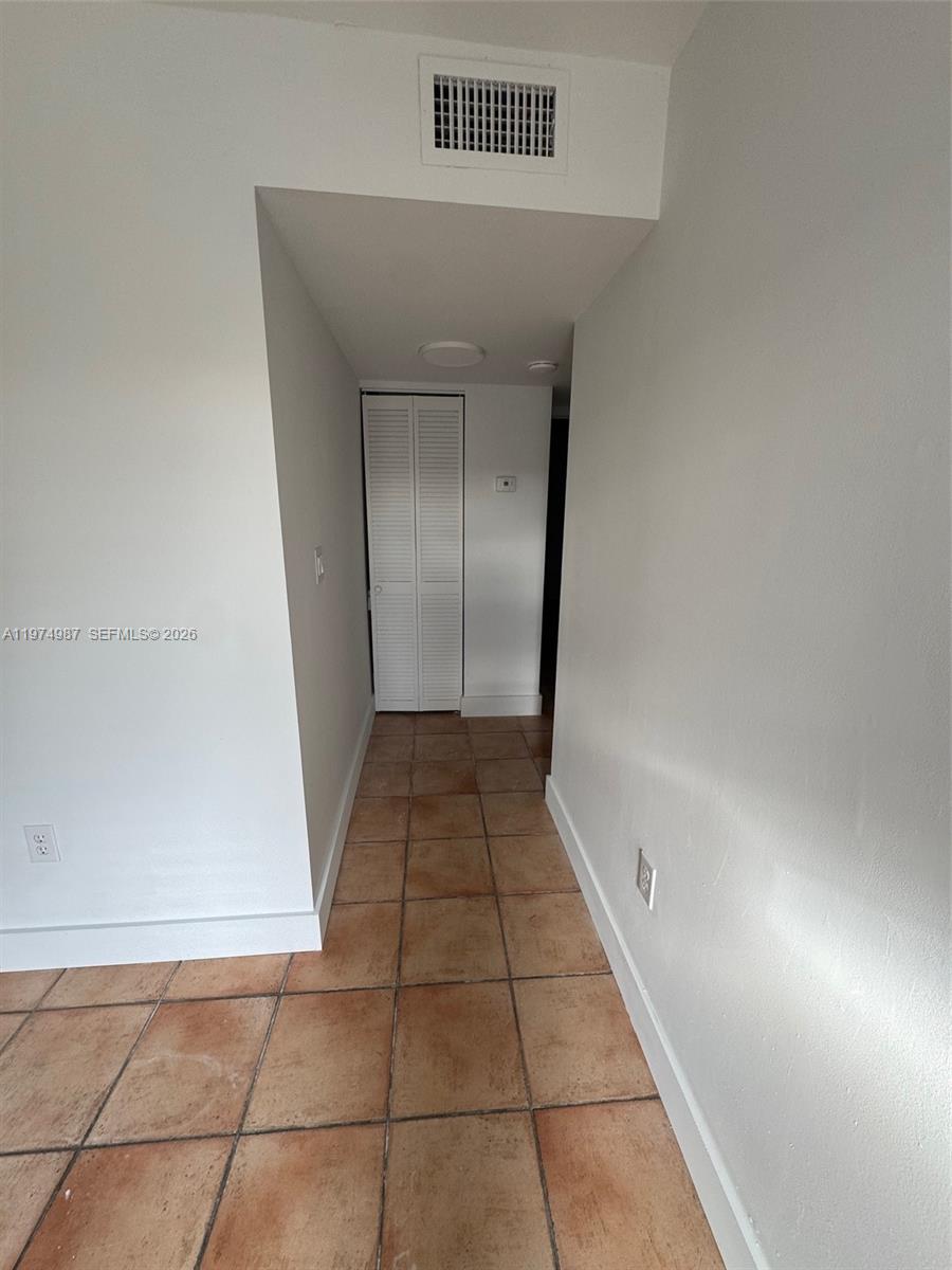 211 West 33rd Street, Unit 2 Hialeah, FL 33012 - Photo 6 of 9 a view of a hallway