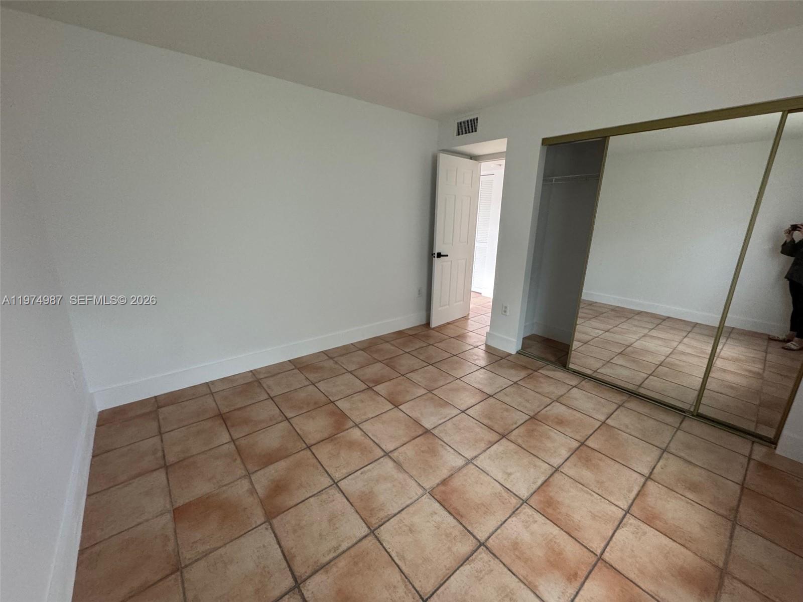 211 West 33rd Street, Unit 2 Hialeah, FL 33012 - Photo 9 of 9 a view of an empty room