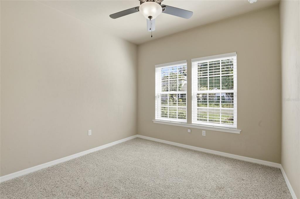 7894 Southwest 80th Drive Gainesville, FL 32608 - Photo 21 of 31 an empty room with a window