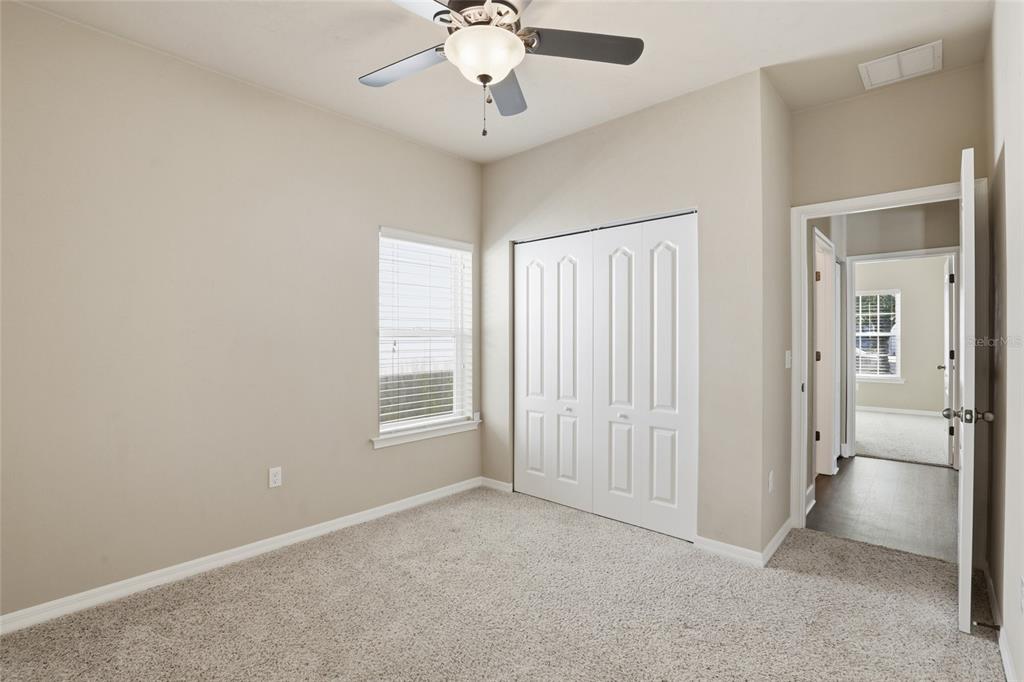 7894 Southwest 80th Drive Gainesville, FL 32608 - Photo 22 of 31 a view of an empty room with a window