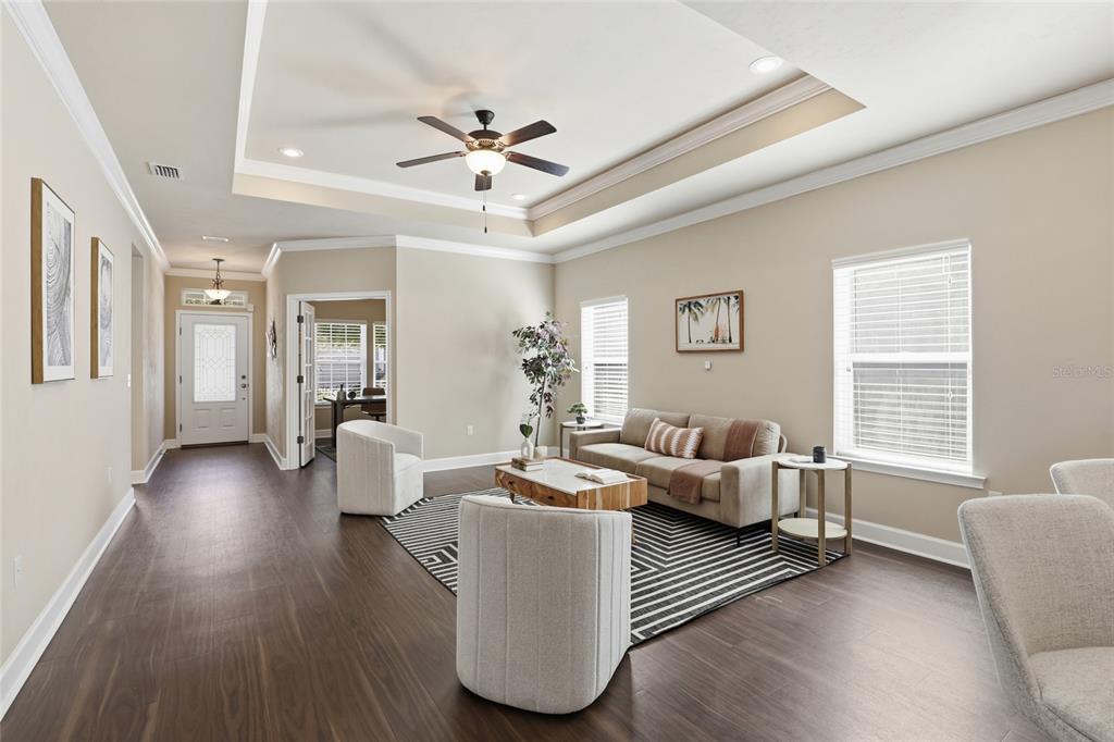 7894 Southwest 80th Drive Gainesville, FL 32608 - Photo 5 of 31 a living room with furniture and wooden floor