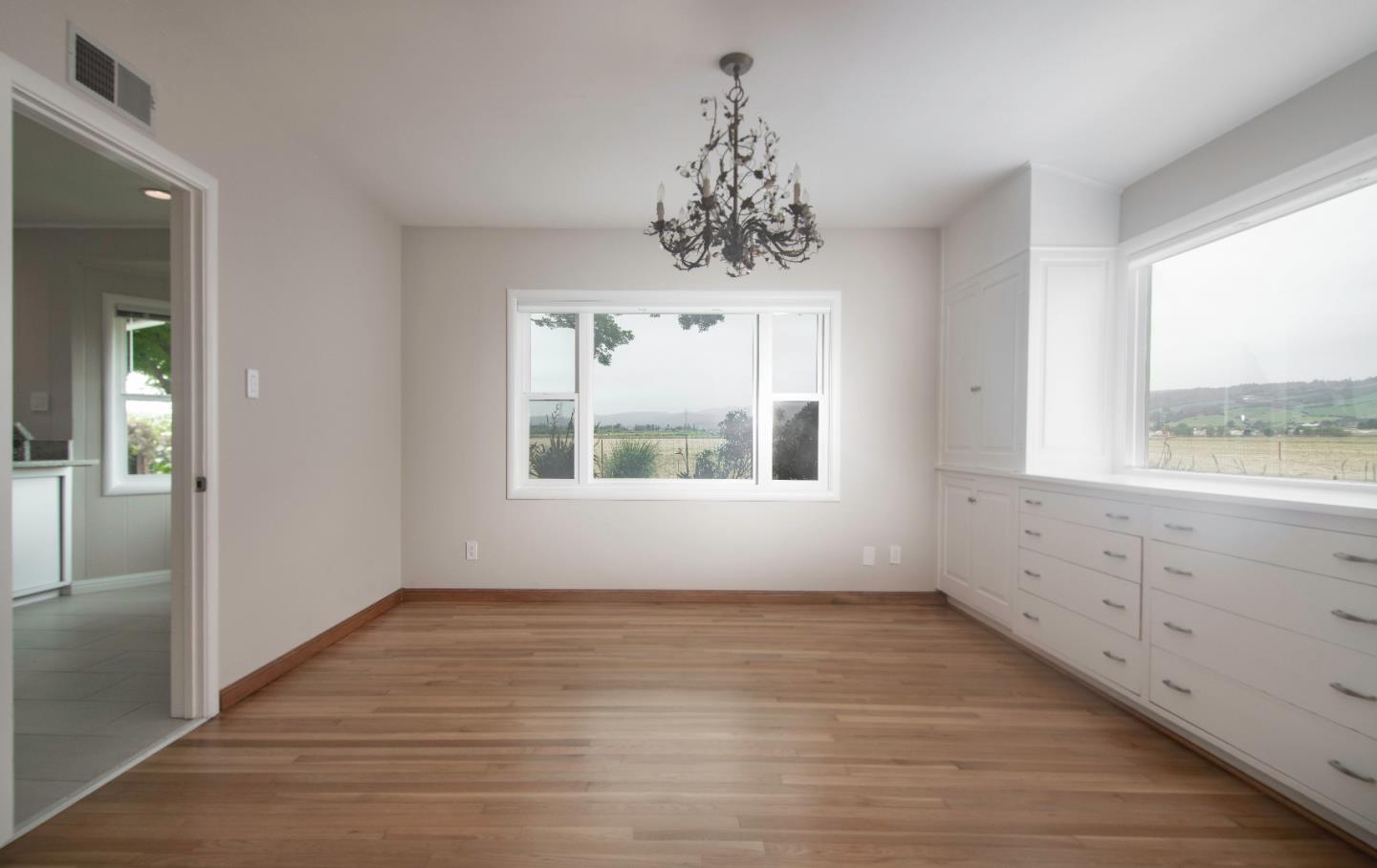 479 Riverside Road Watsonville, CA 95076 - Photo 7 of 22 a view of an empty room with a window