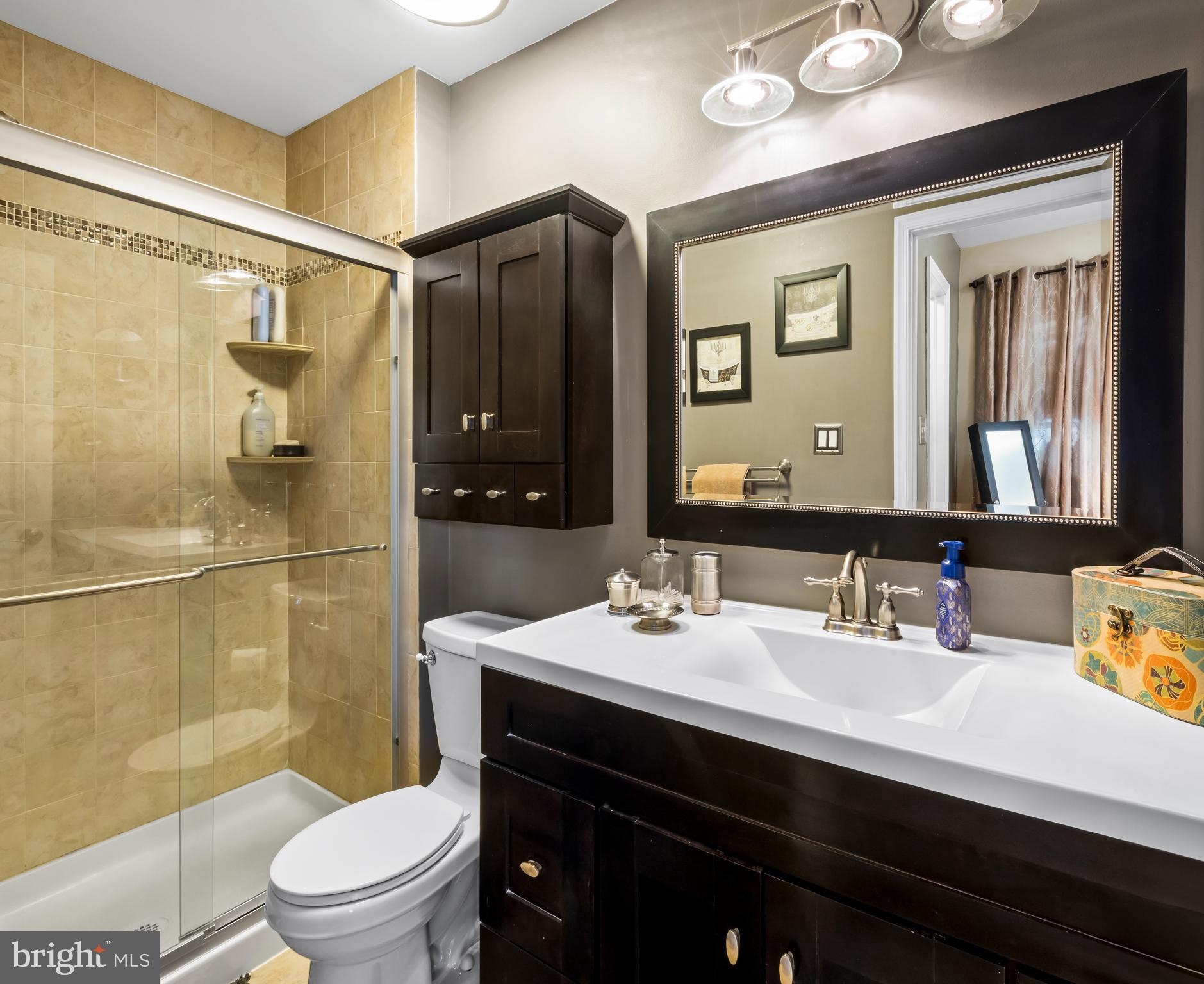 34 Borrelly Boulevard Sewell, NJ 08080 - Photo 16 of 23 a bathroom with a sink vanity mirror and toilet
