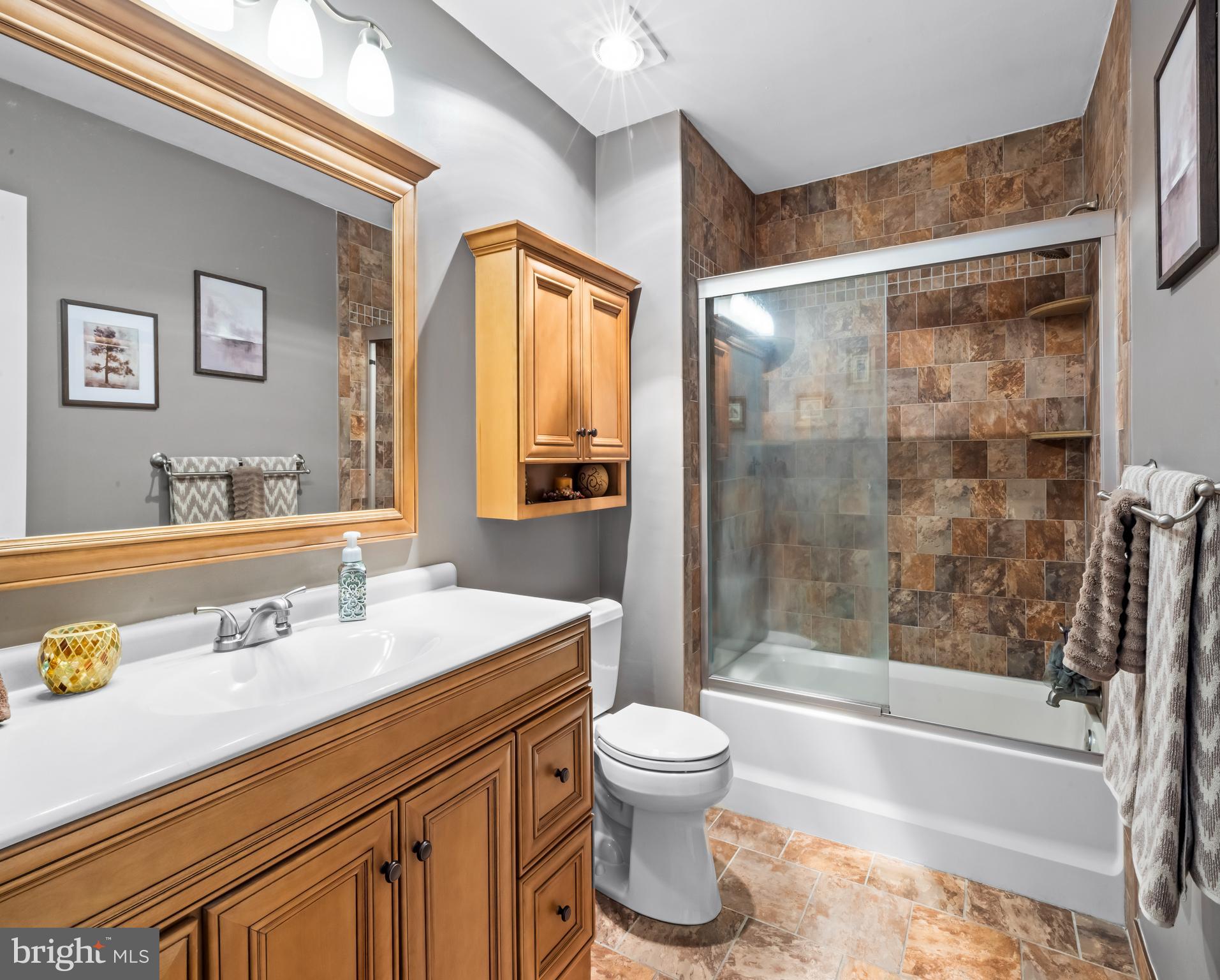 34 Borrelly Boulevard Sewell, NJ 08080 - Photo 17 of 23 a bathroom with a sink mirror toilet and bathtub