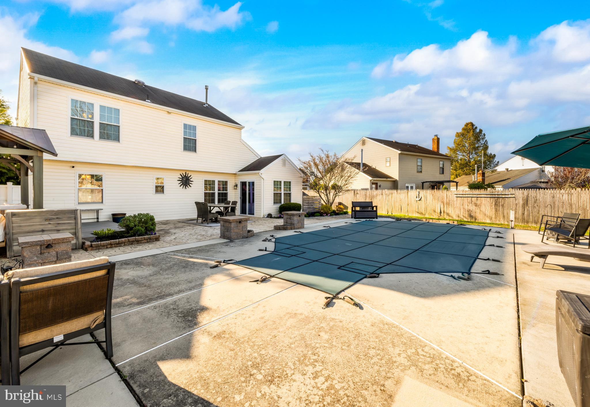 34 Borrelly Boulevard Sewell, NJ 08080 - Photo 21 of 23 a view of a white house with swimming pool in front of it